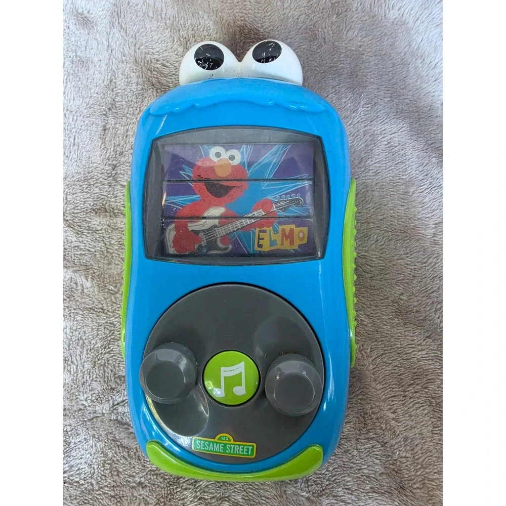 Sesame Street Cookie Monster Musical Toy Elmo Ernie Big Bird Blue Handheld 2010